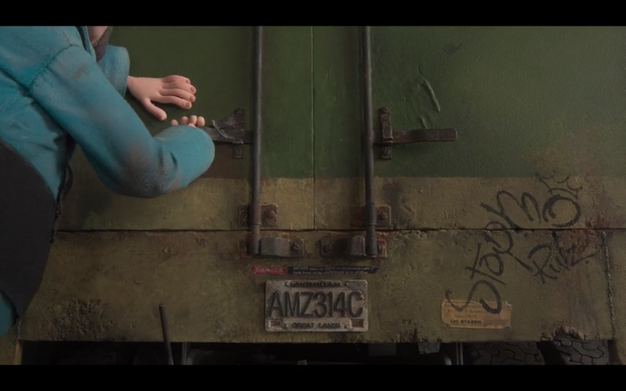 a closeup shot of the action in the opening sequence of Coraline
