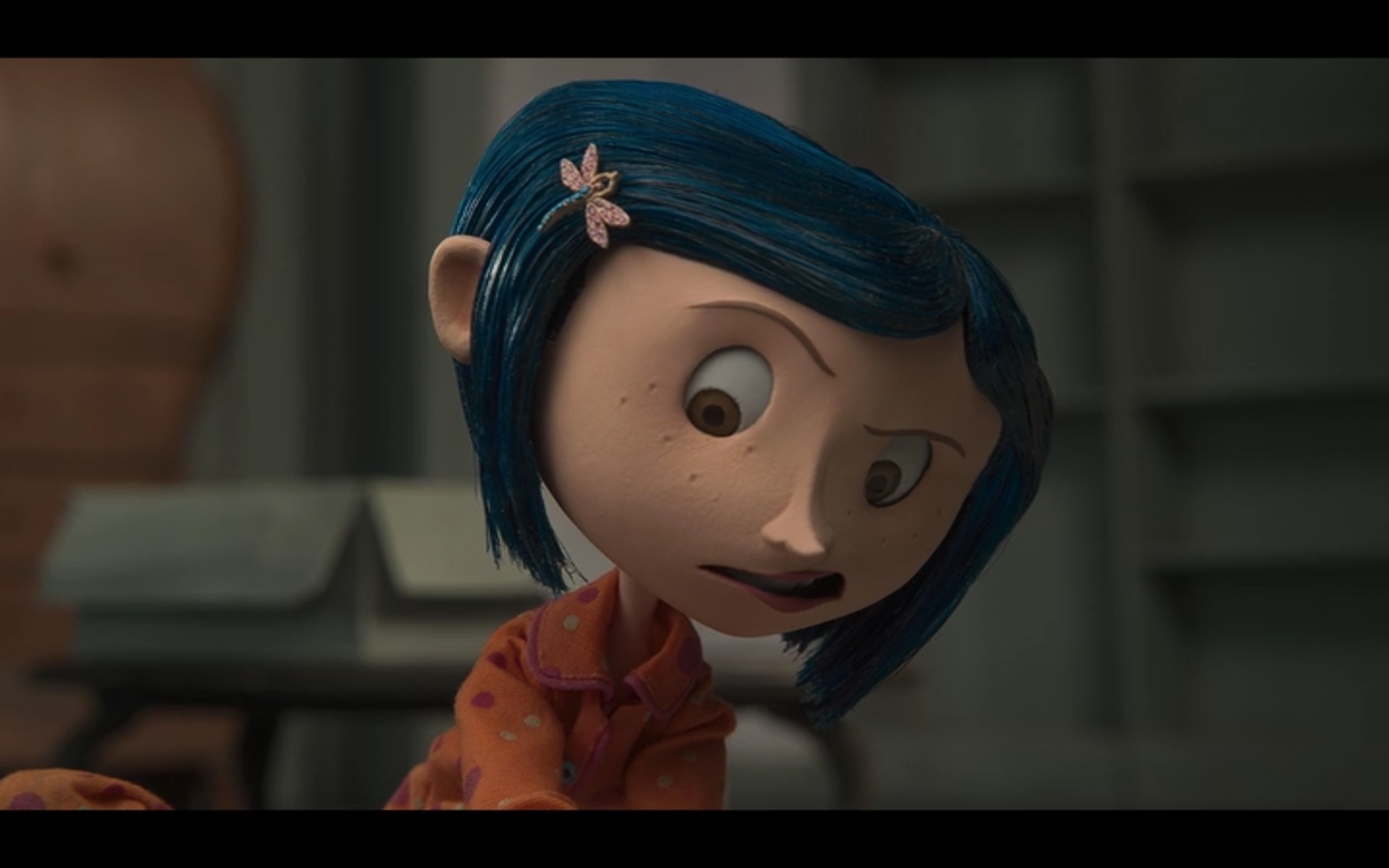 practice film vocabulary with this medium closeup shot of Coraline